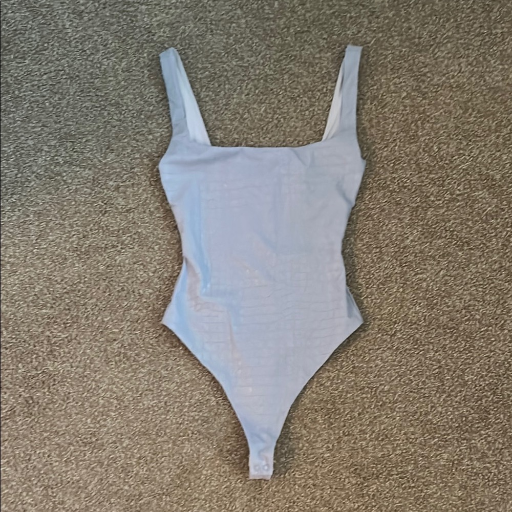Naked wardrobe lavender Bodysuit nwt